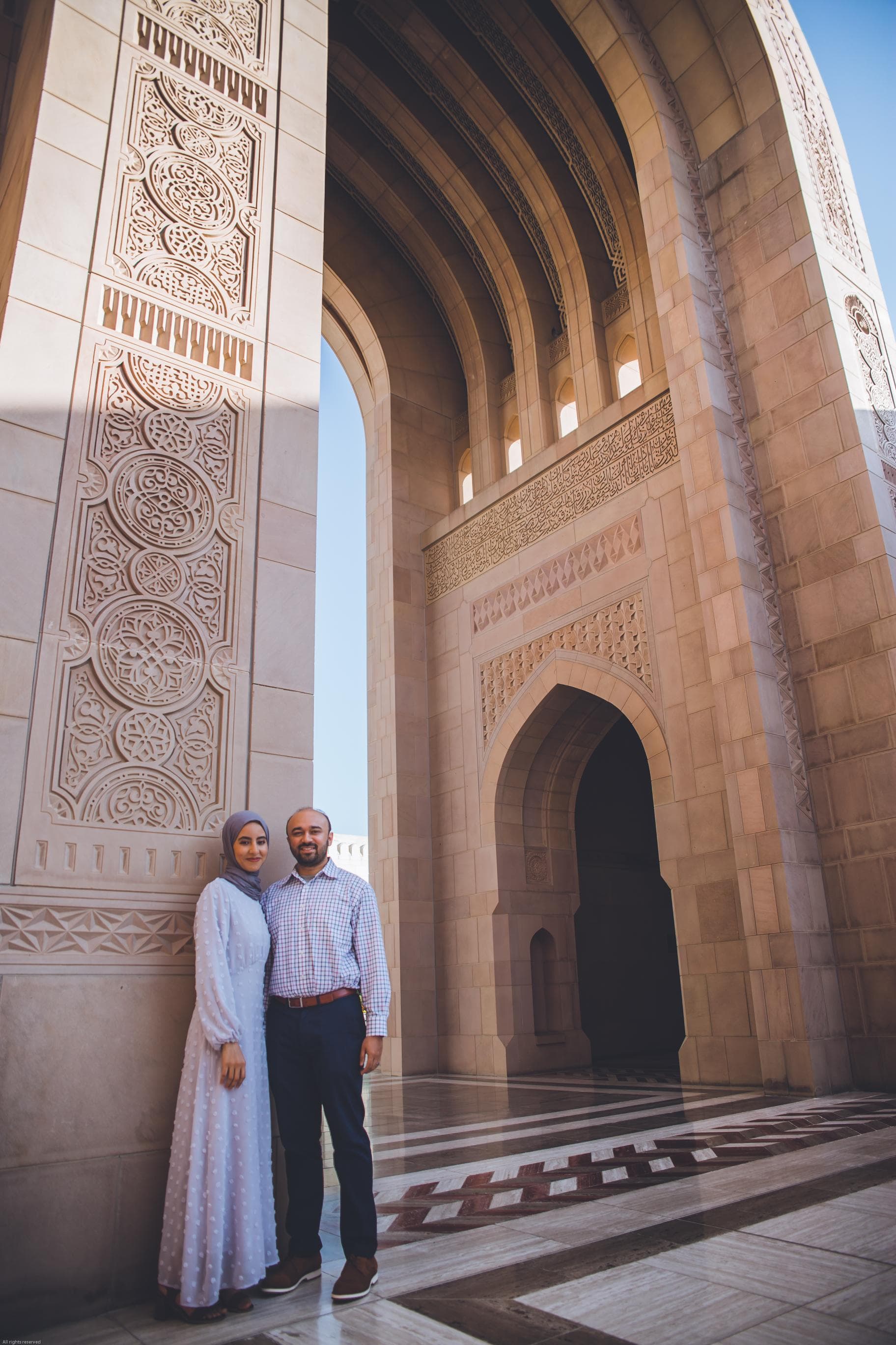 Couple portrait session at Sultan Qaboos Grand Mosque